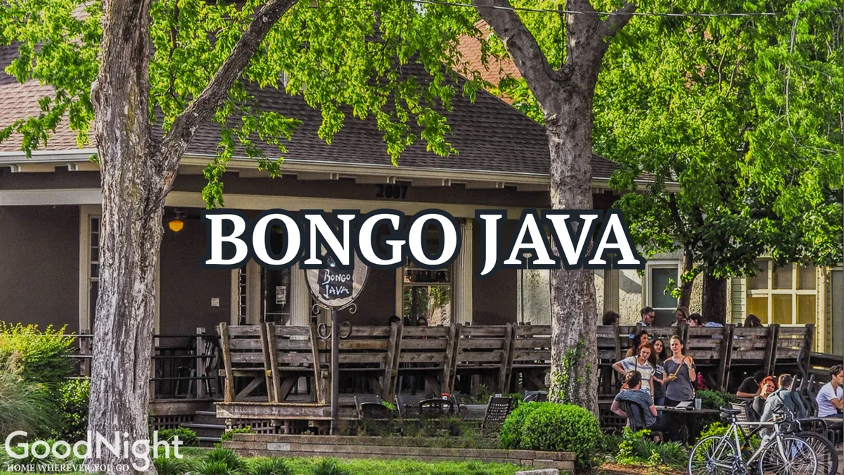 This image features the Bongo Java coffee shop’s outdoor seating area, with people enjoying coffee, socializing, and reading. The Bongo Java sign is prominent, inviting passersby to stop in. The relaxed atmosphere captures the neighborhood’s vibrant, walkable character.